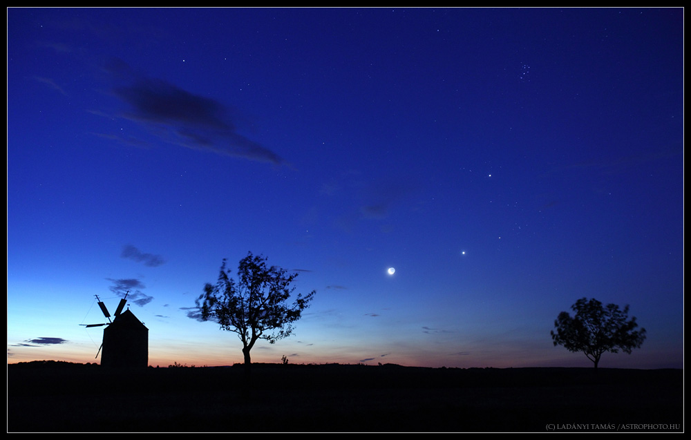 Dazzling Night Sky Over Historic Windmill (Photo)